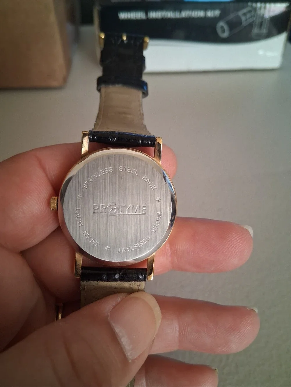 Pro Tyme Branded Gold-Tone Watch with Black Leather Strap